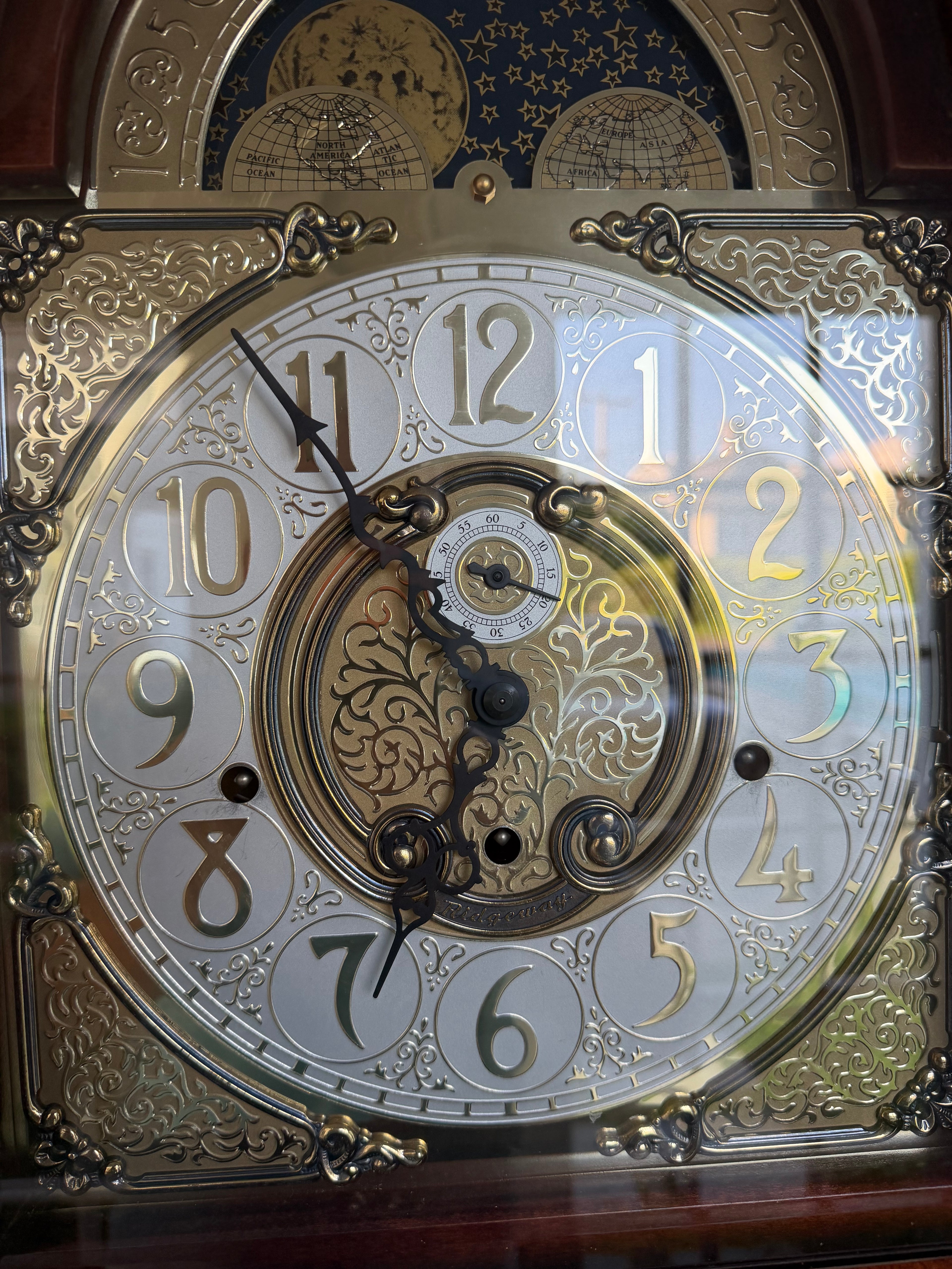 Howard Miller Grandfather clock and curios case