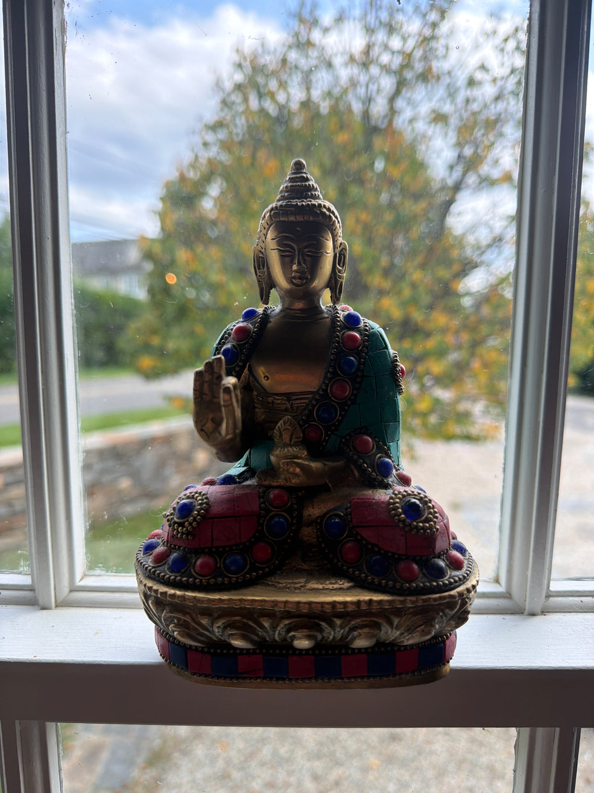 Brass Thai Buddha statue.