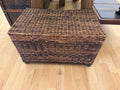 Lidded wicker storage chest