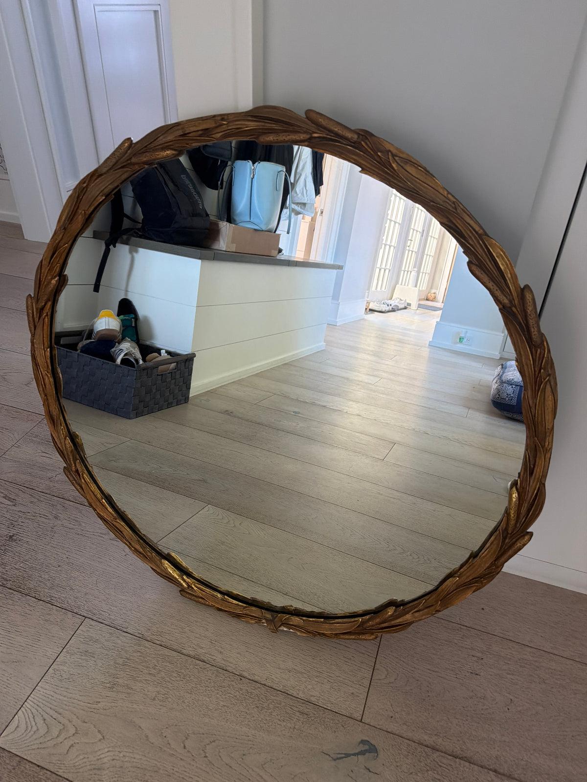 Large round ‘laurel’ gold tone mirror