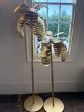 Pair of golden metal palm trees