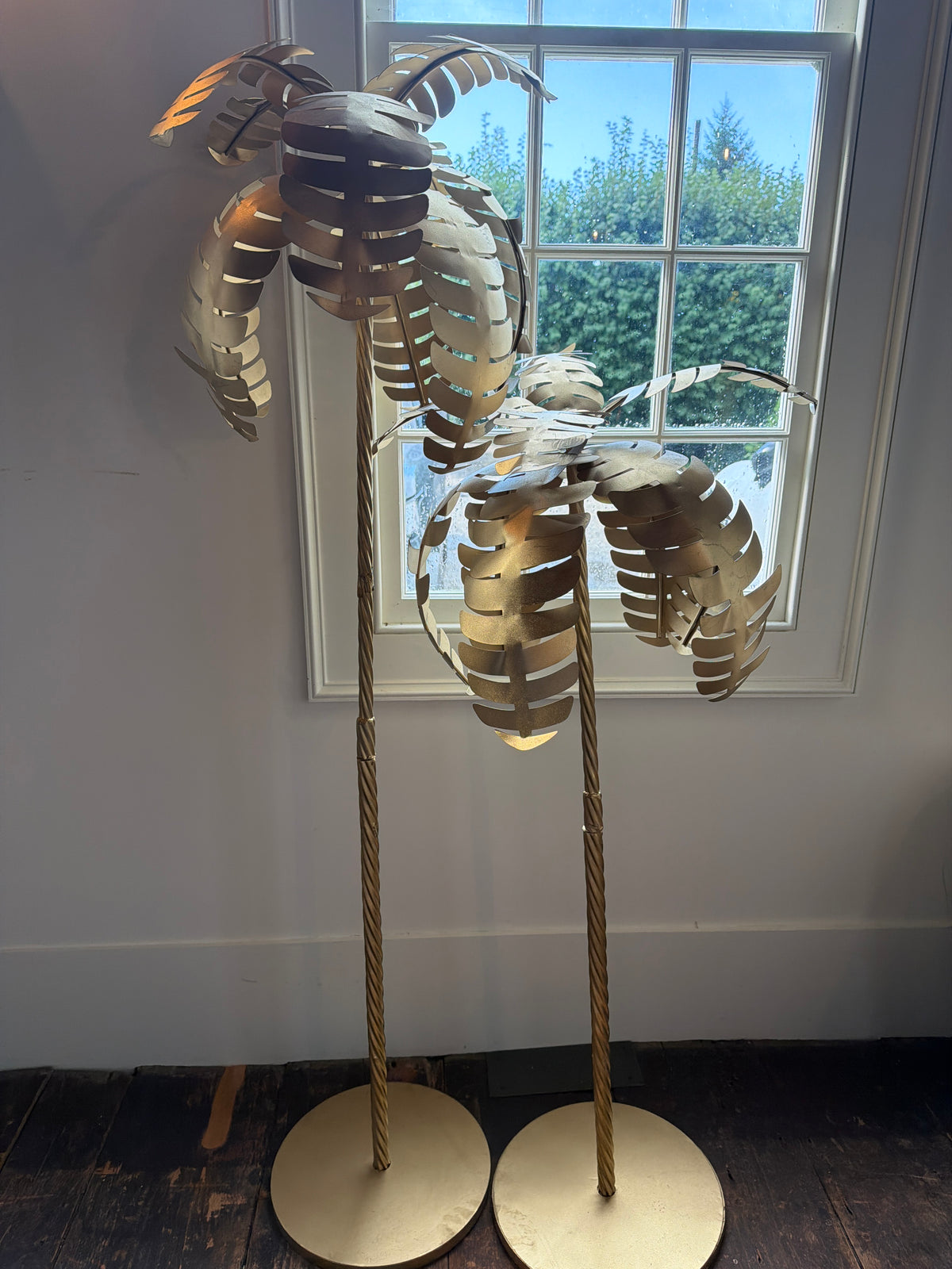 Pair of golden metal palm trees