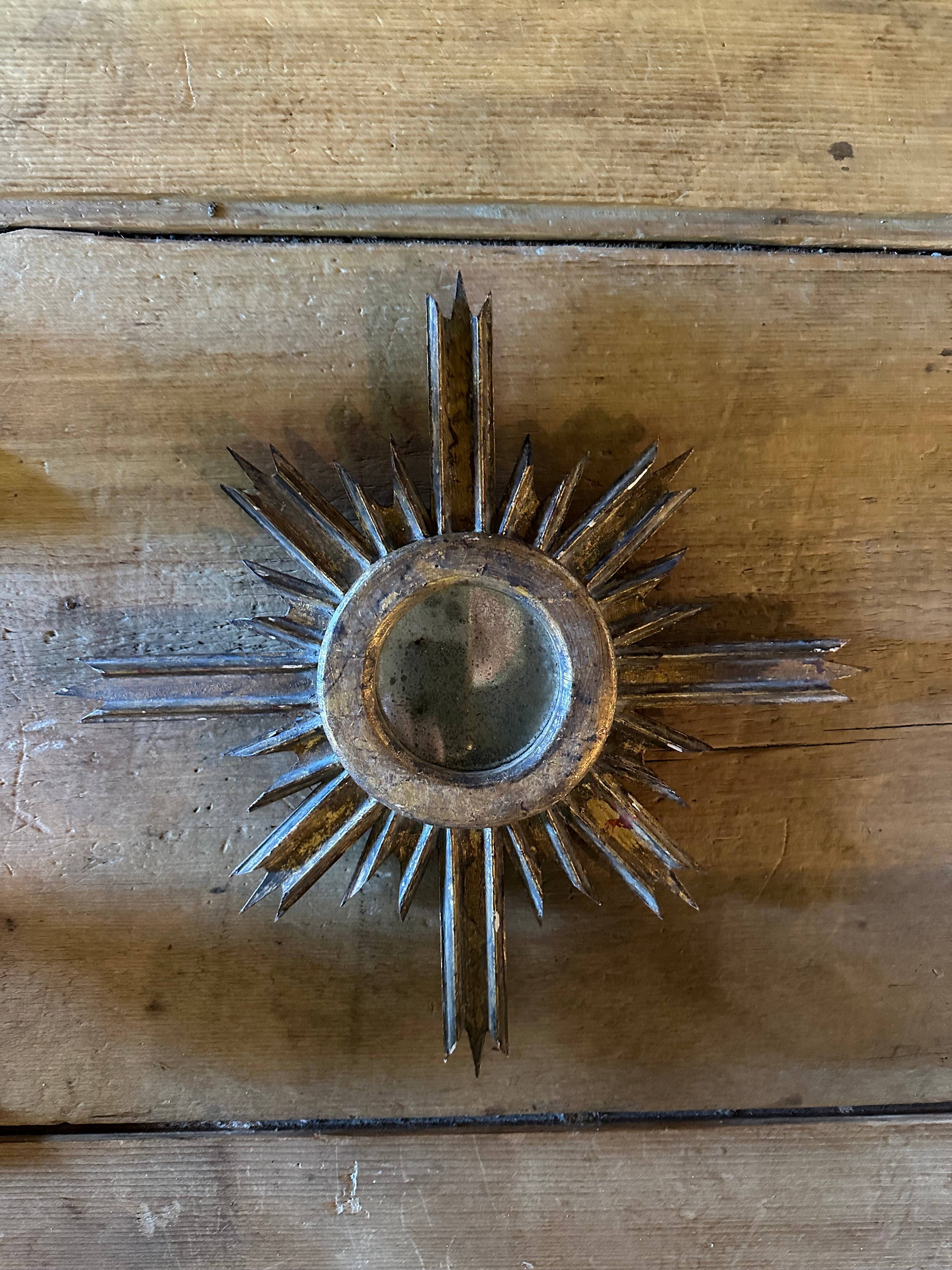 Antique sunburst mirror
