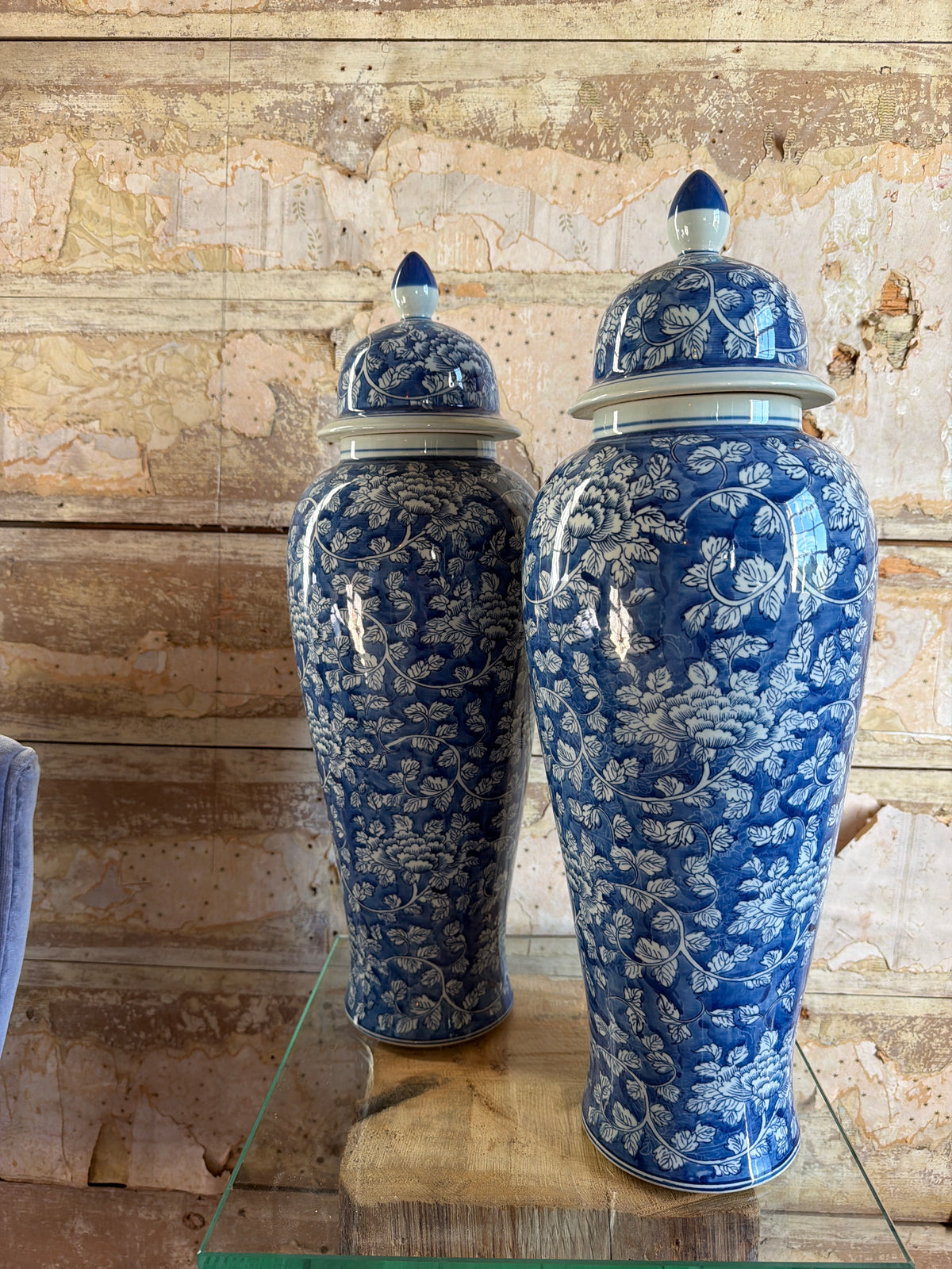 Pair of porcelain lidded slender vases