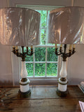 Pair of Hollywood regency style opaque white glass and guilt bouillotte table lamps.