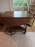 Antique mahogony drop leaf tea trolley