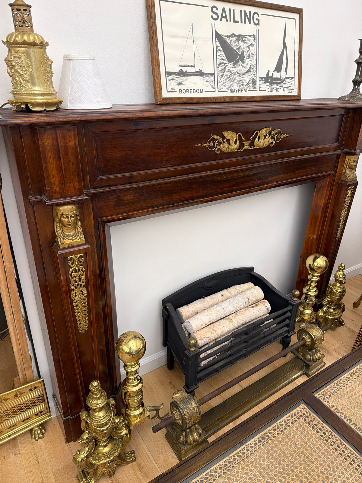French Empire style Fireplace inlaid with brass decorations