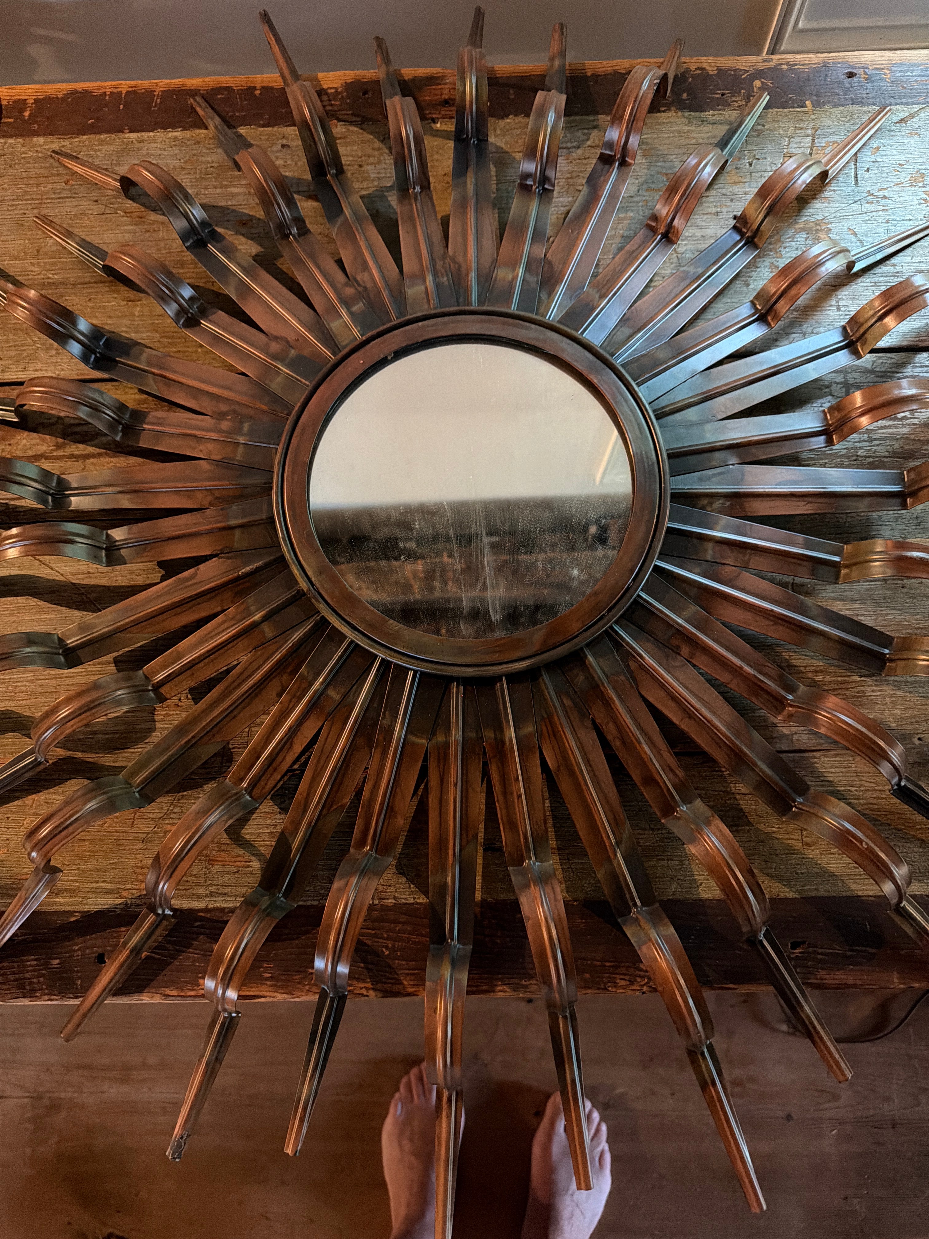 Sunburst metal mirror