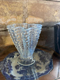 Fluted glass vase with blue hue