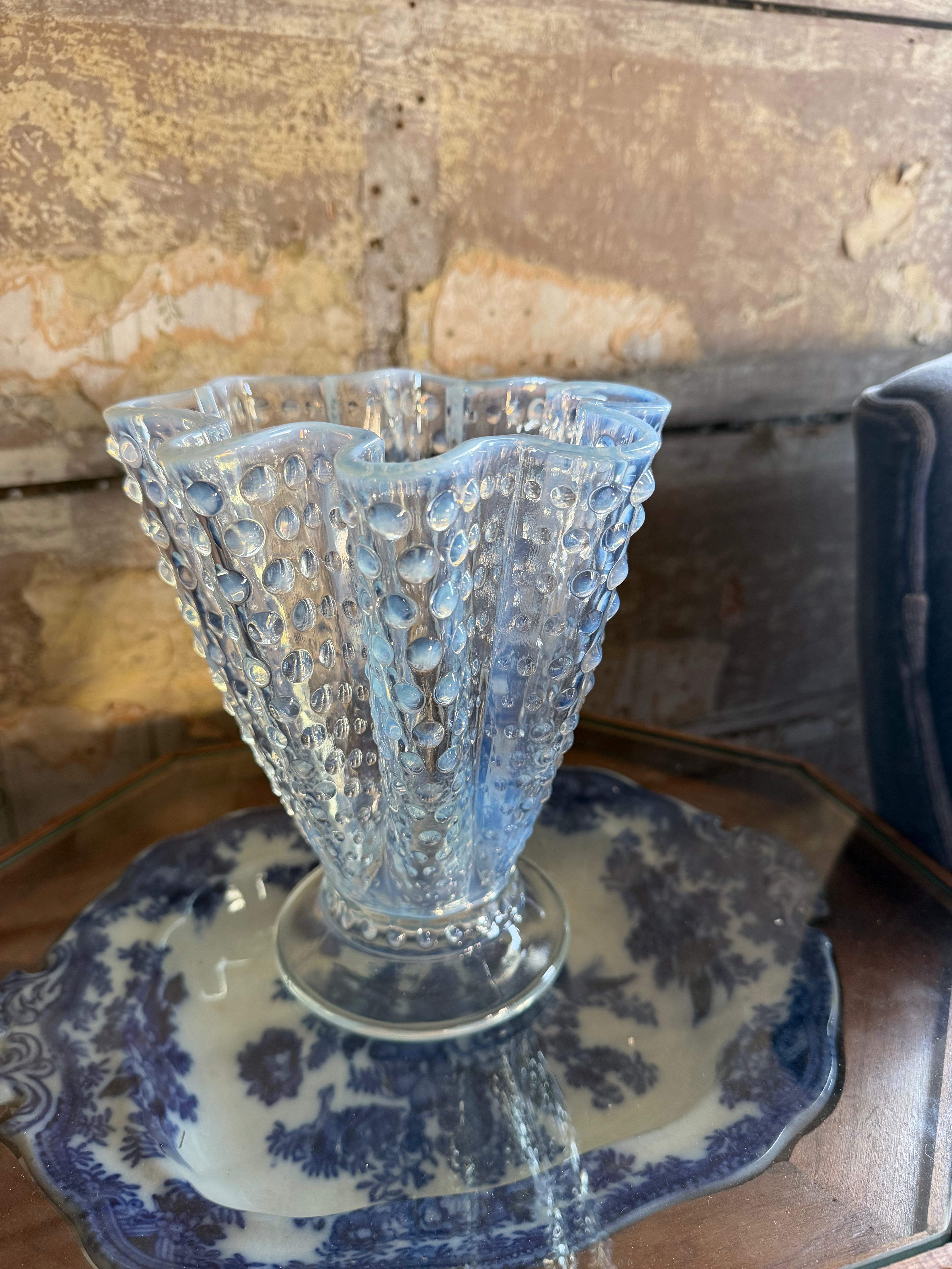Fluted glass vase with blue hue