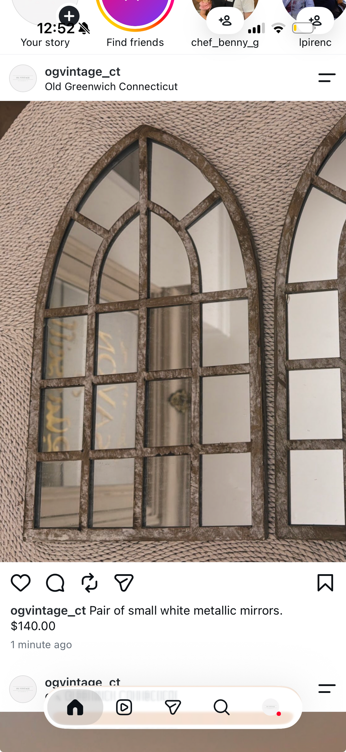 Pair of small white metallic mirrors.